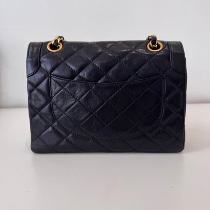 Sac Chanel vintage noir fermoir bicolore