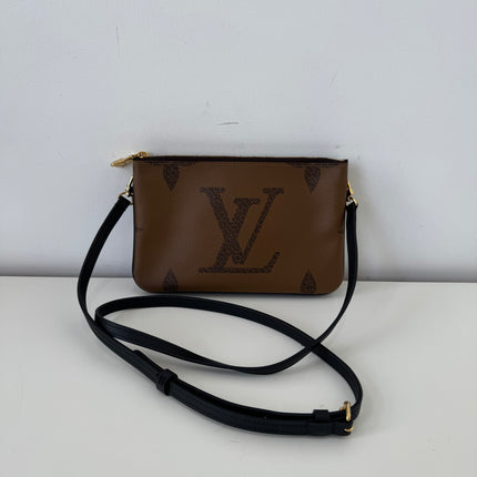 Sac pochette double zip Louis Vuitton reverse