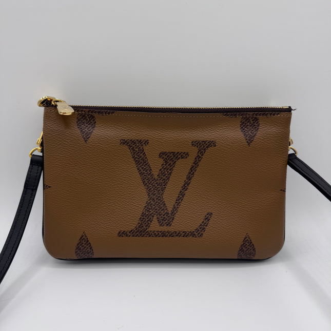 Pochette double zip Louis Vuitton