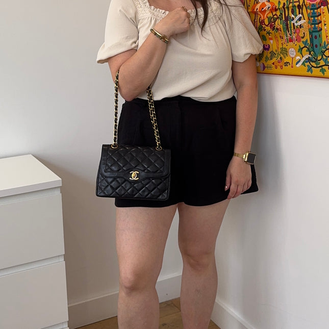 Sac Chanel vintage noir fermoir bicolore