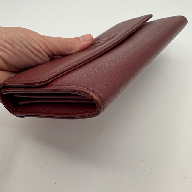 Portefeuille Chanel rouge éteint