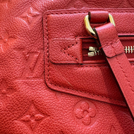 Sac Louis Vuitton Lumineuse cuir empreinte rouge