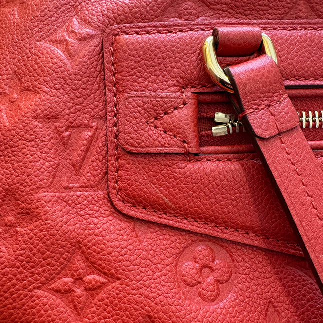 Sac Louis Vuitton Lumineuse cuir empreinte rouge