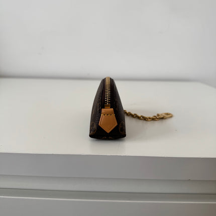 Pochette Louis Vuitton Cosmétique rouge à lèvres