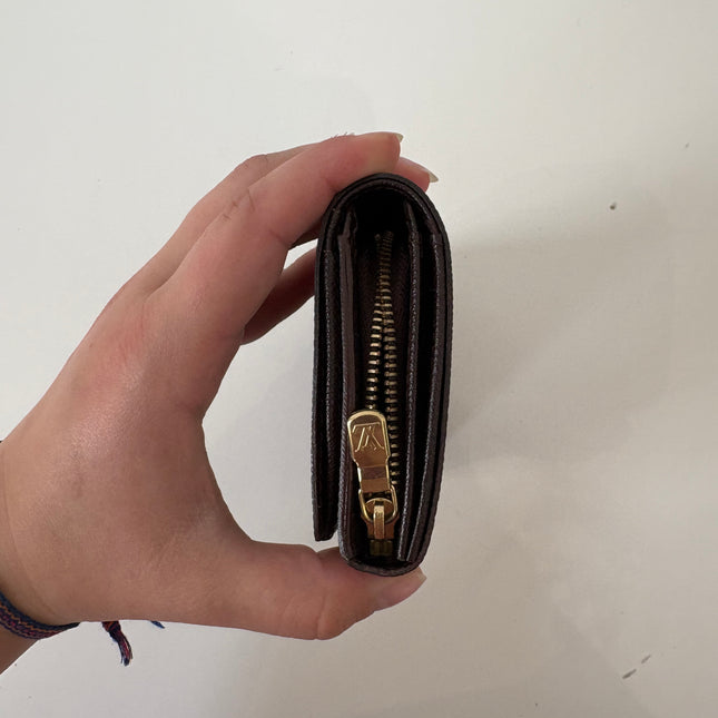 Porte monnaie/ portefeuille Louis Vuitton