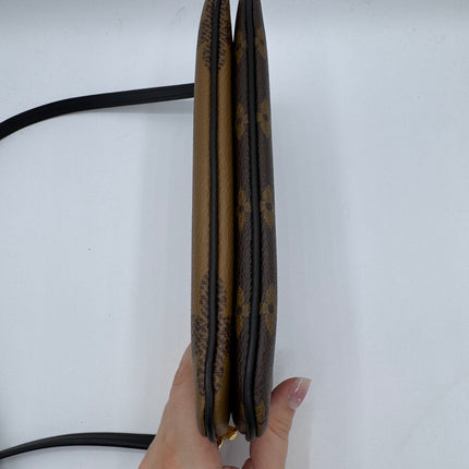 Pochette double zip Louis Vuitton