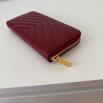 Portefeuille Saint Laurent Cassandre zip Bordeaux