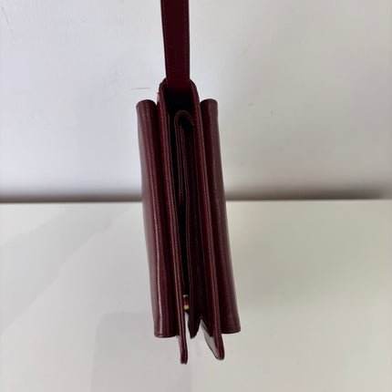 Pochette Cartier à Dragonne bordeaux