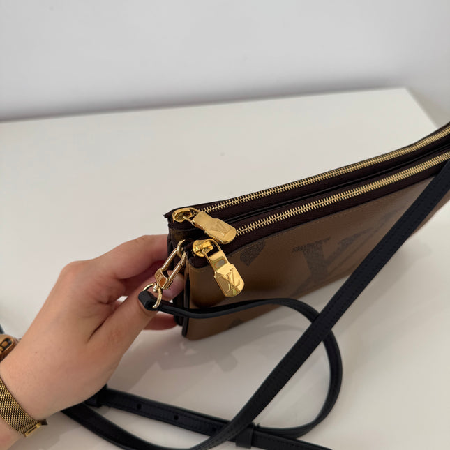Sac pochette double zip Louis Vuitton reverse