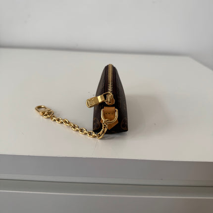 Pochette Louis Vuitton Cosmétique rouge à lèvres