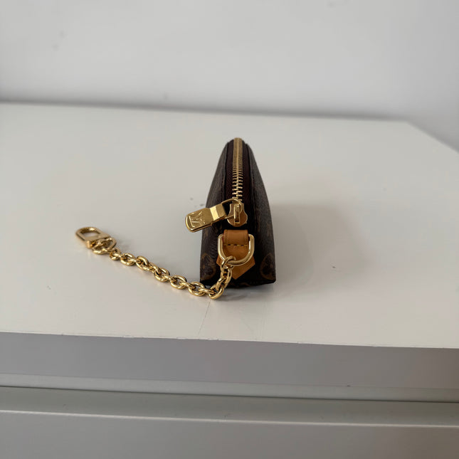 Pochette Louis Vuitton Cosmétique rouge à lèvres