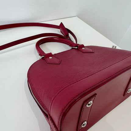 Sac Louis Vuitton bb Alma cuir épi framboise